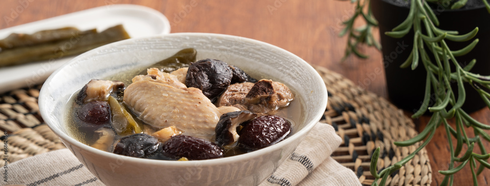 Delicious Taiwanese peeled green chili pepper chicken soup with mushroom