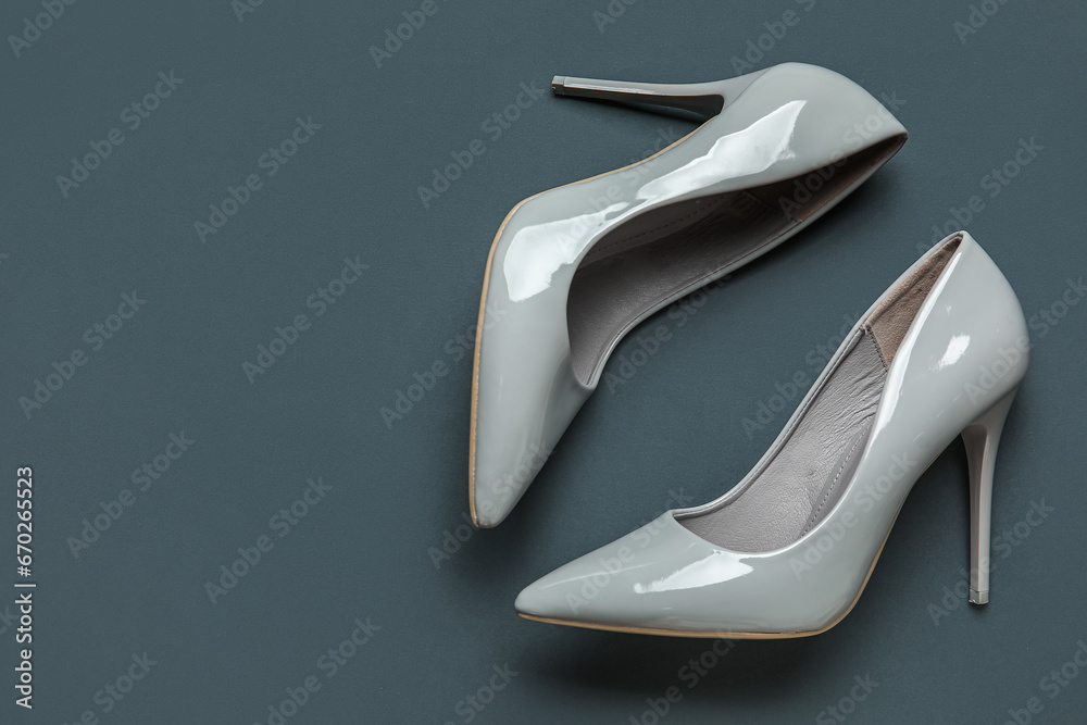 Stylish high heels on grey background