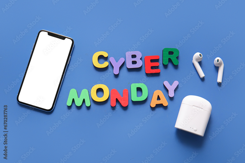 Text CYBER MONDAY made of letters and gadgets on color background