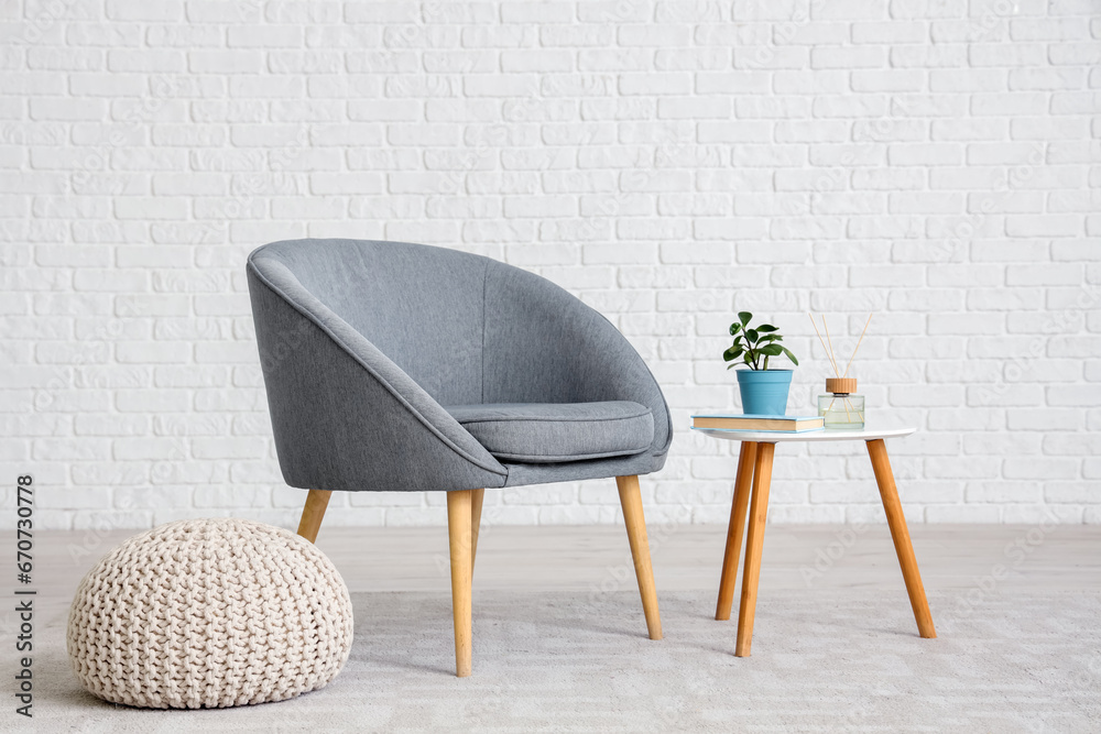 Simple interior with armchair and coffee table