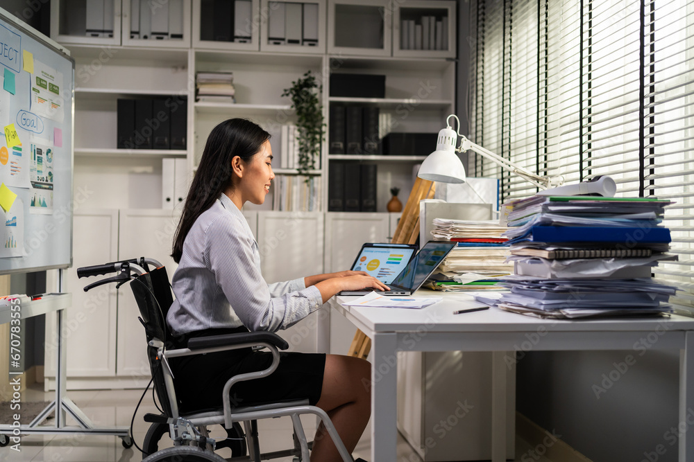 Asian young businesswoman working in office workplace with happiness. 