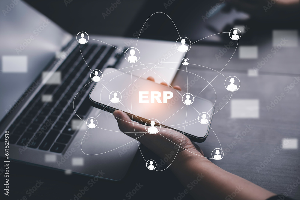 Business people working laptops with document management for ERP. Enterprise resource planning concept, Enterprise Resource Management ERP software system for business resources plan presented.