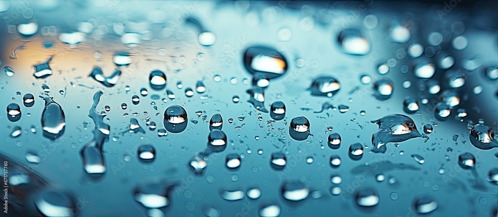 The sight of a raindrop resting on the windshield