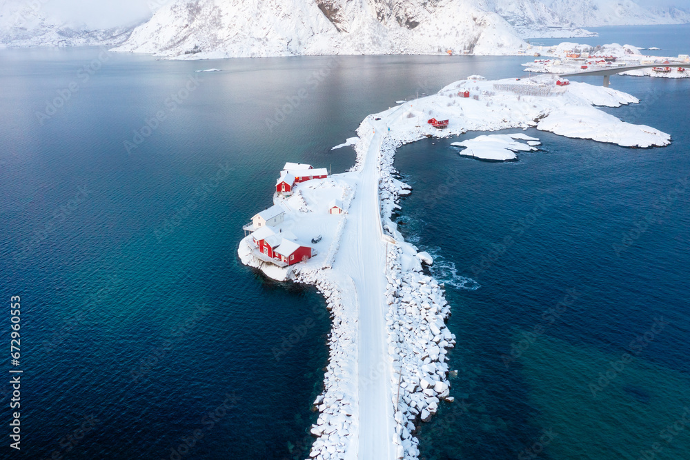 Aerial view on the Lofoten Islands, Norway. Landscape in winter time during day time. View from drone. Aerial landscape. Mountains and water. Norge image