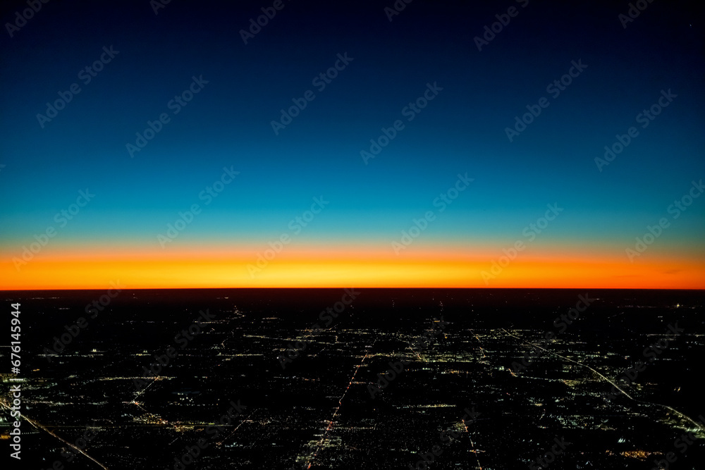 Dramatic colorful sunset over the horizon with Tokyo in the foreground