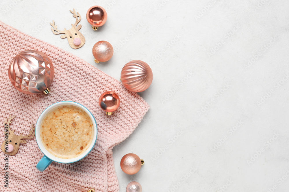 Cup of coffee with Christmas decor on white background