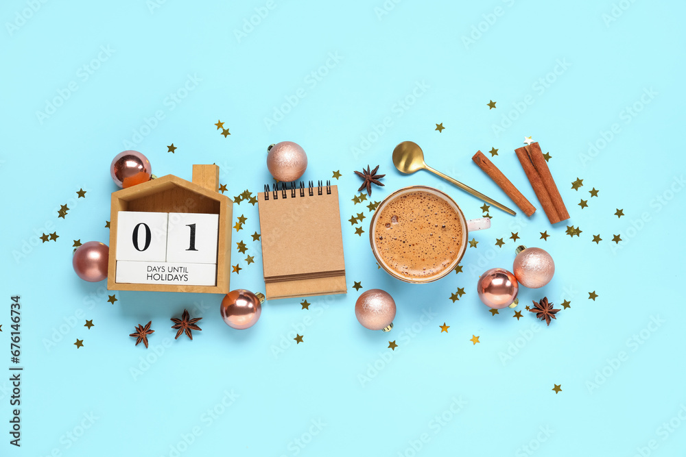 Composition with cup of coffee and Christmas decor on blue background