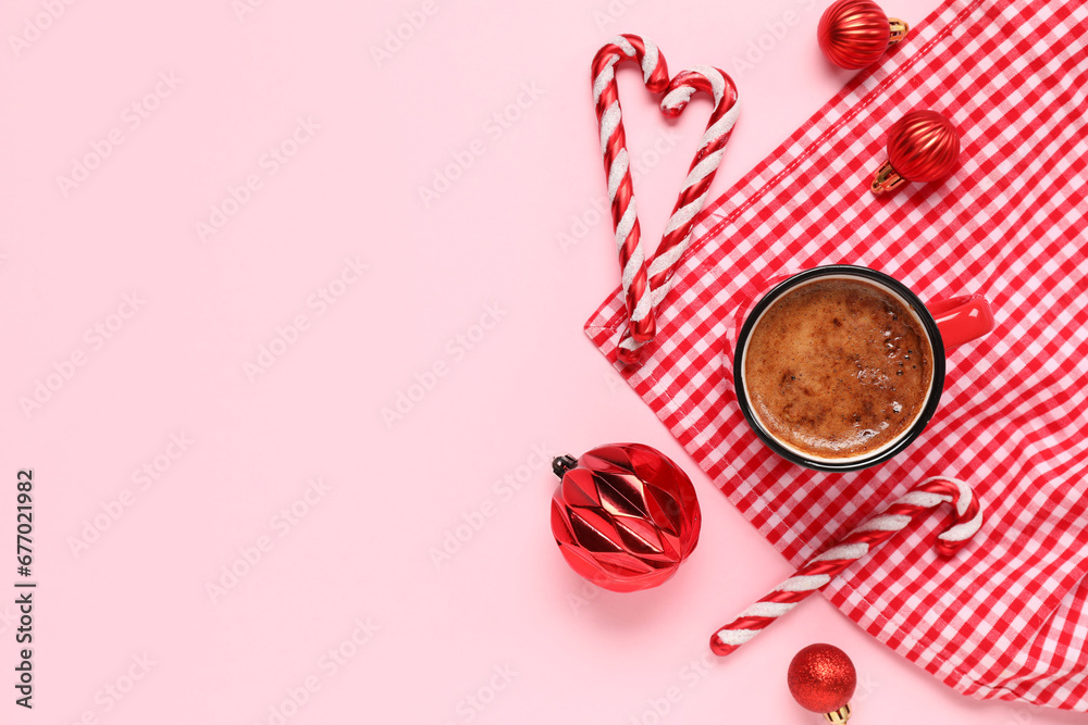 Mug of coffee with Christmas decor on pink background