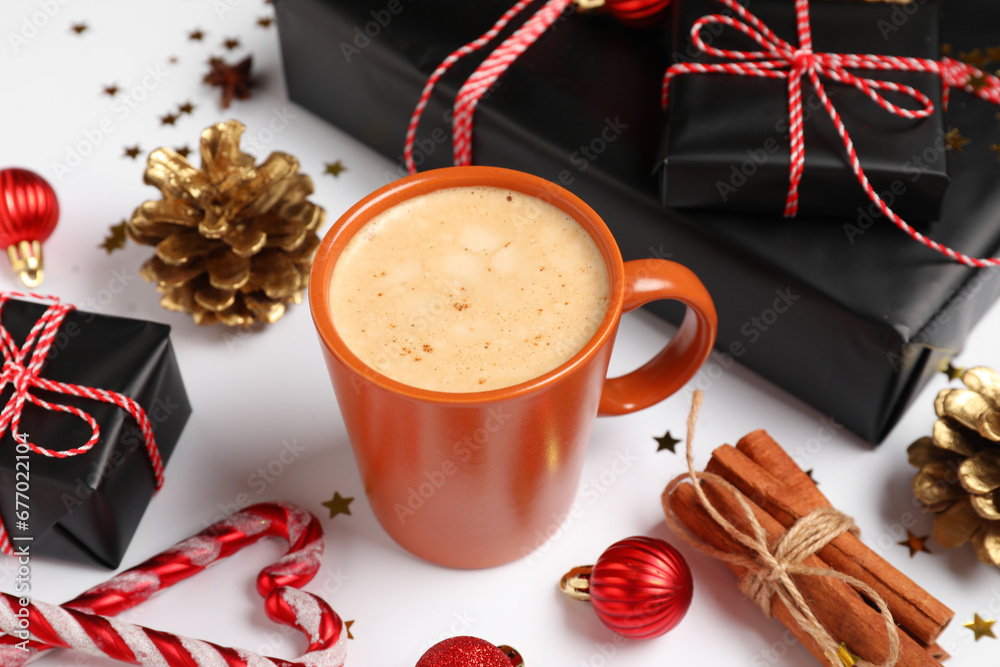 Beautiful composition with cup of coffee and Christmas decor on grey background