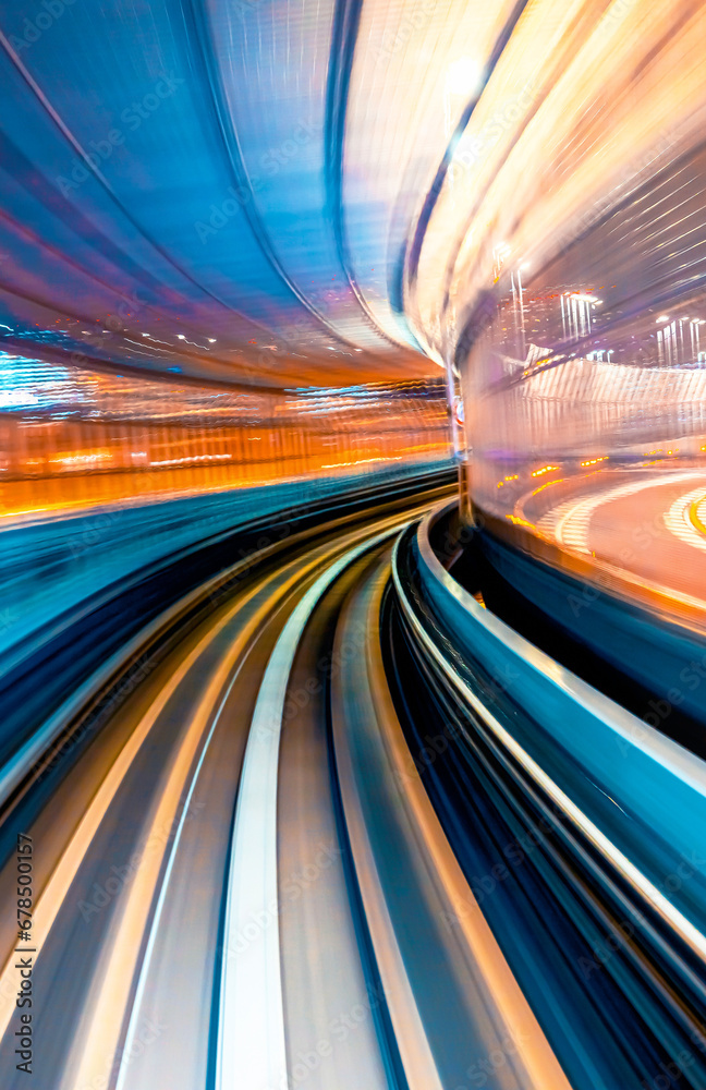 Abstract high speed technology POV motion blurred concept image from the Yuikamome monorail in Tokyo, Japan