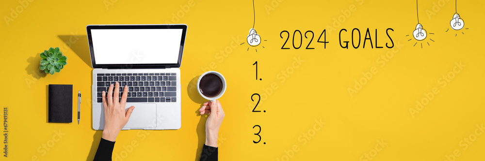 2024 goals with person using a laptop computer