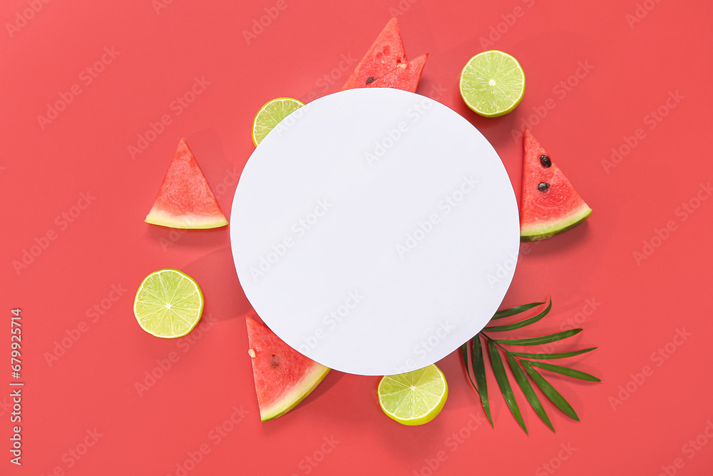 Blank card and pieces of fresh watermelon with lime on red background