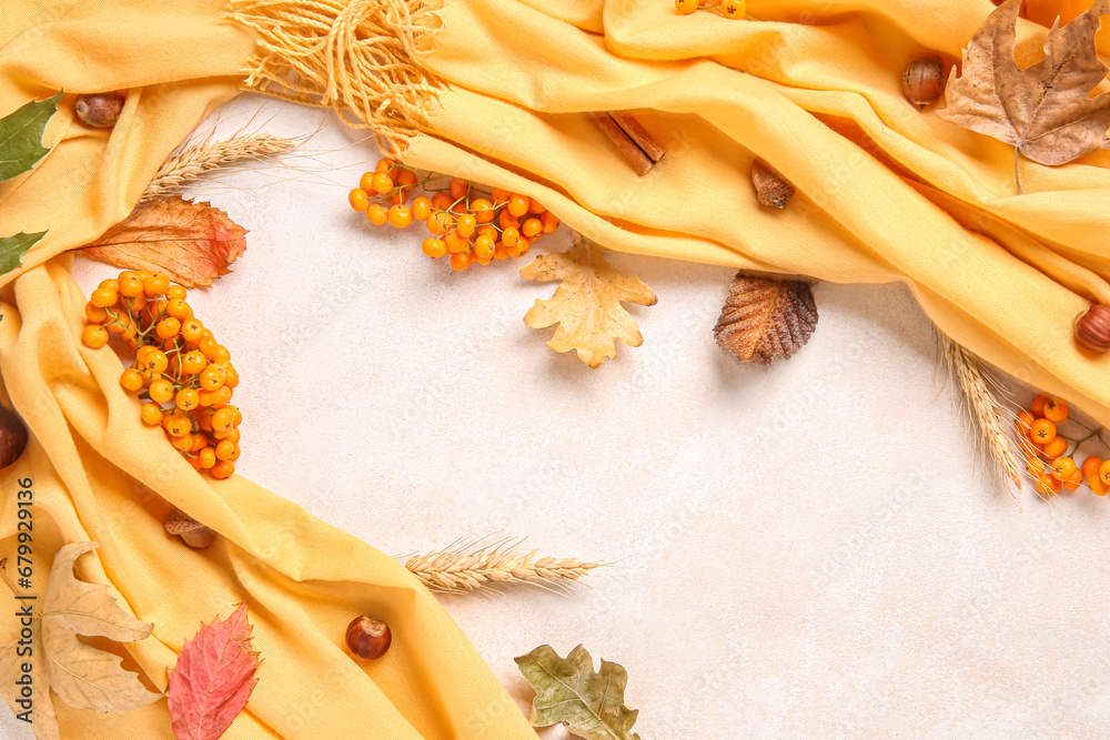 Autumn leaves with acorns, rowan and ears of wheat on white background