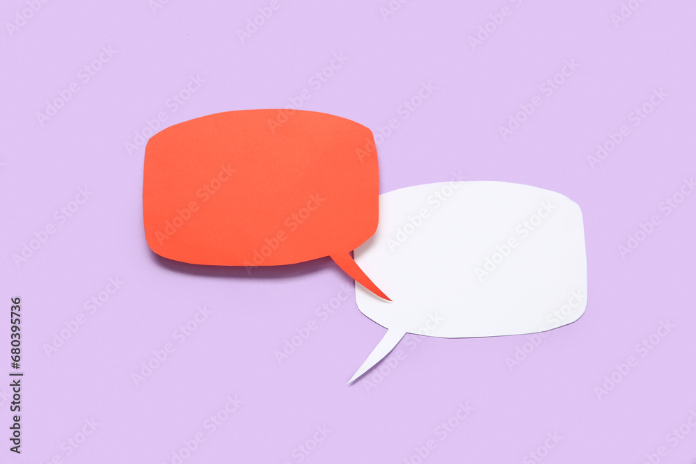 Blank speech bubbles on lilac background