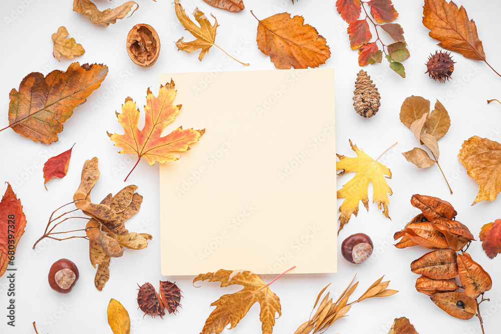 Beautiful autumn composition with blank card on white background