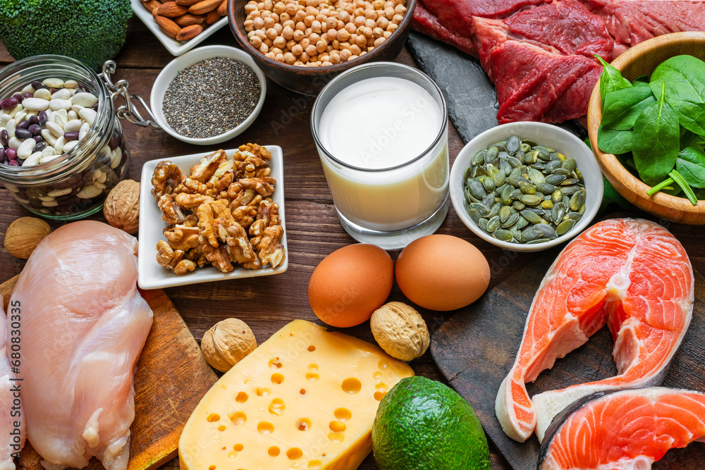 High vegetable and animal protein food sources. Fish, meat, poultry, nuts, cheese, eggs, seeds, vegetables and milk. Healthy eating and balanced food concept. Keto and low carb diet