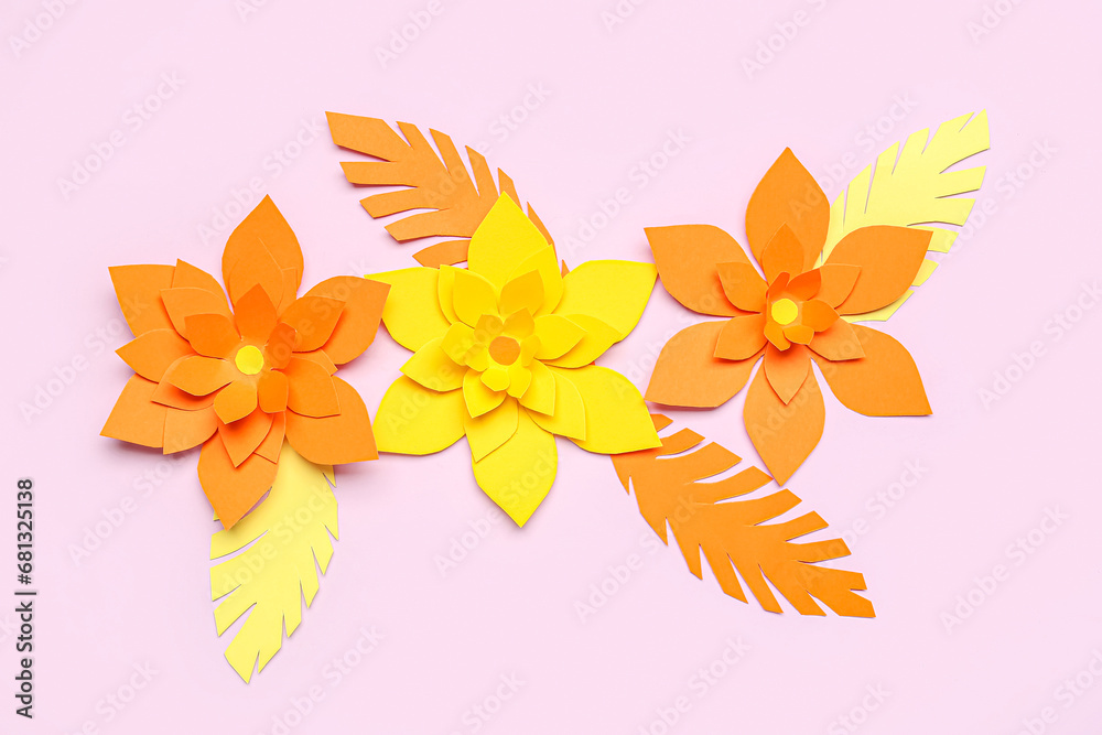 Colorful origami flowers with leaves on purple background