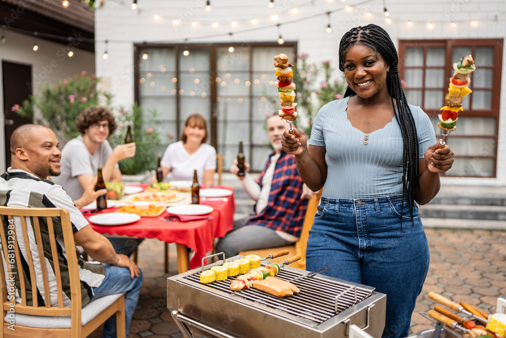 Portrait of African woman having fun, enjoy party outdoors in garden. 