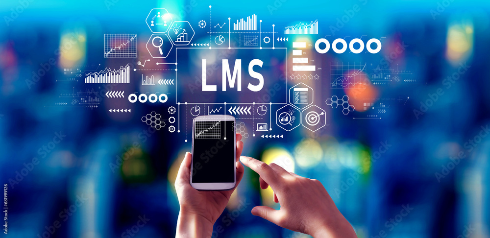 LMS - Learning Management System with person using a smartphone in a city at night